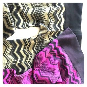 2 pairs of Lululemon herringbone leggings.